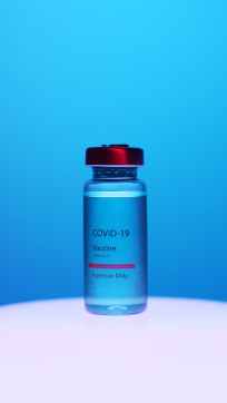 glass vial containing coVid vaccine